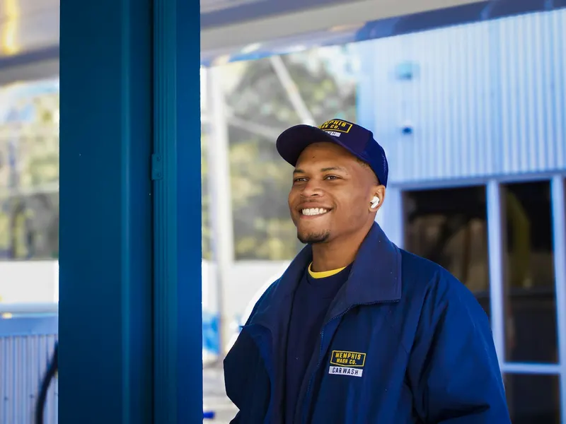 A uniformed heating technician on site