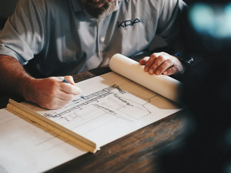 Drafting the kitchen plan by hand
